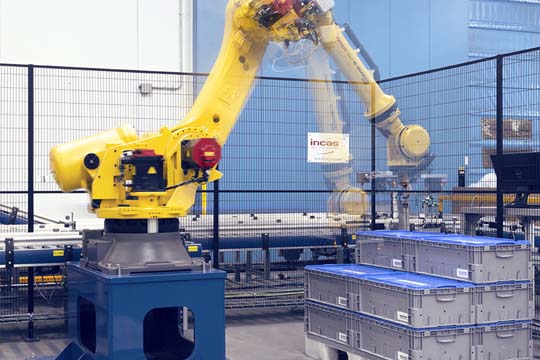 Stazione di palettizzazione e de-palettizzazione automatica con robot antropomorfo